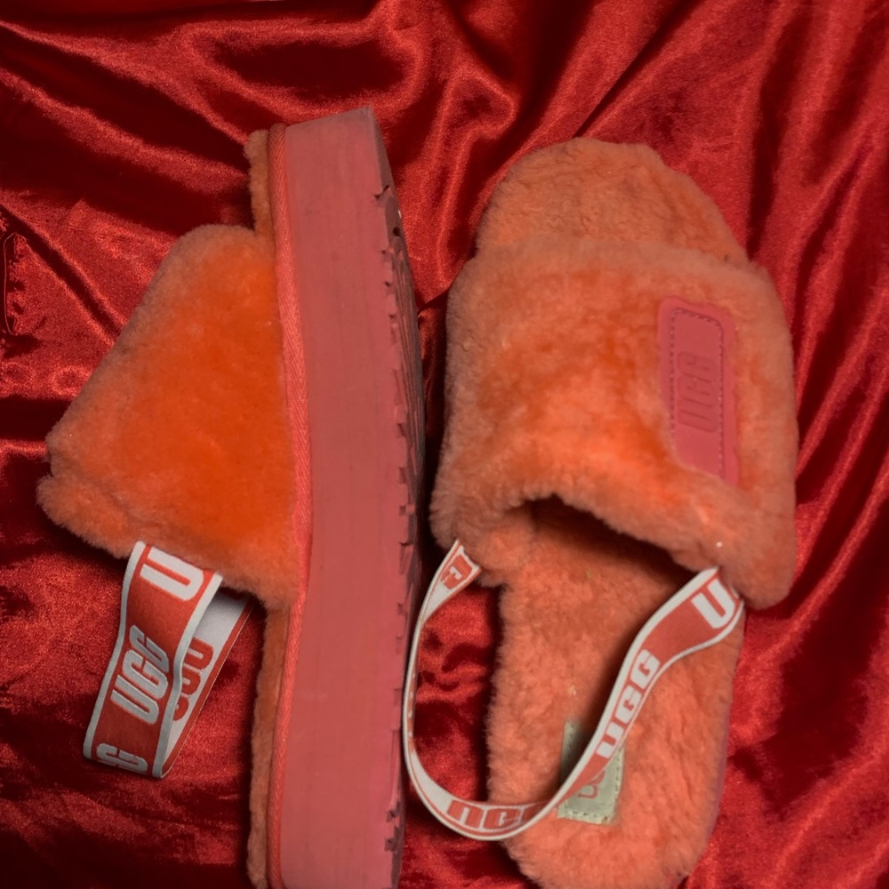 UGG Orange Slippers with Plush Material and Open Back Design